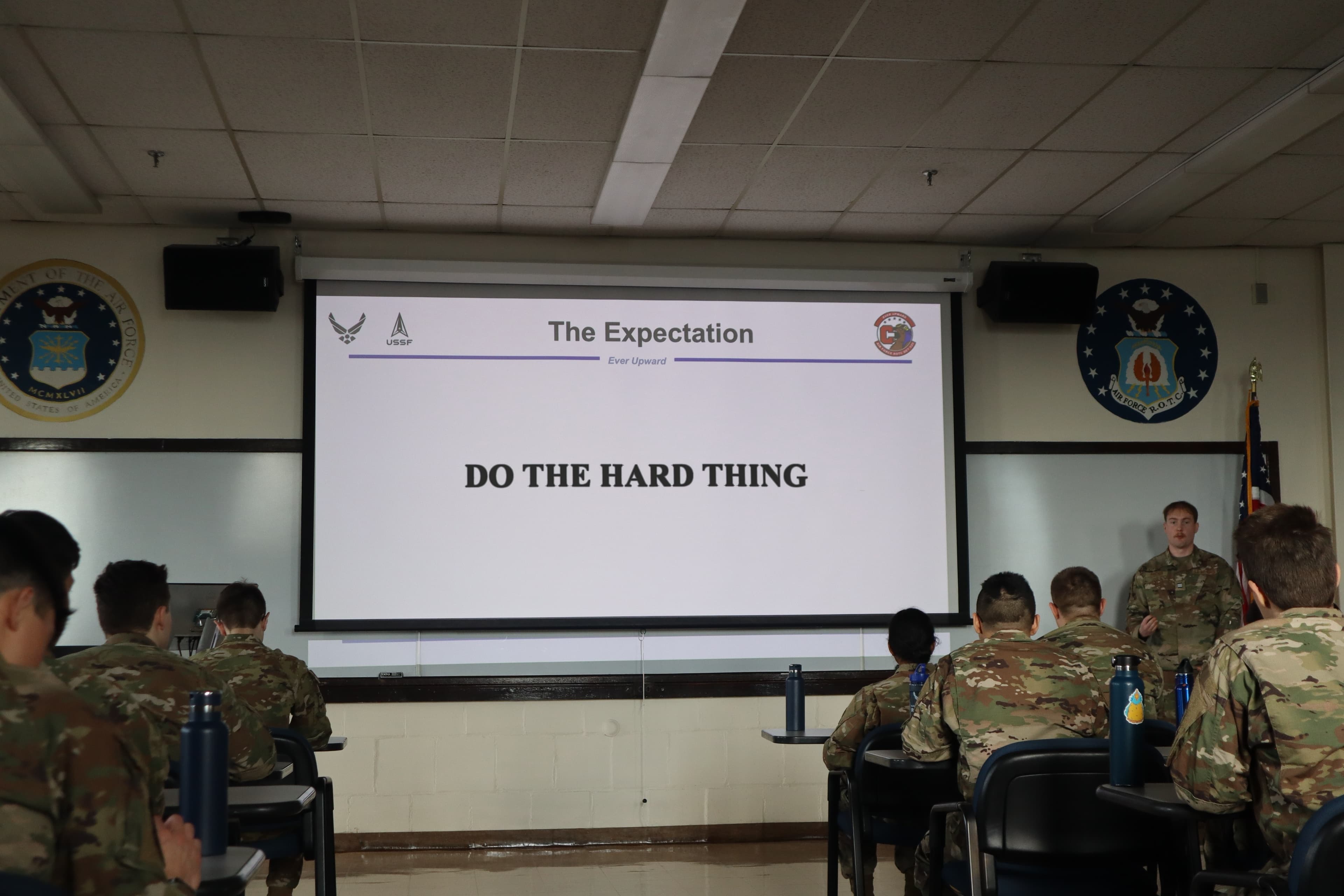 Cadets seated in the detachment classroom during a briefing.